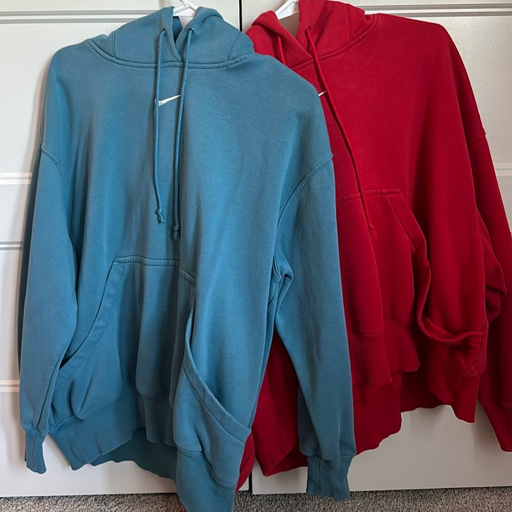 Two Nike sweatshirts